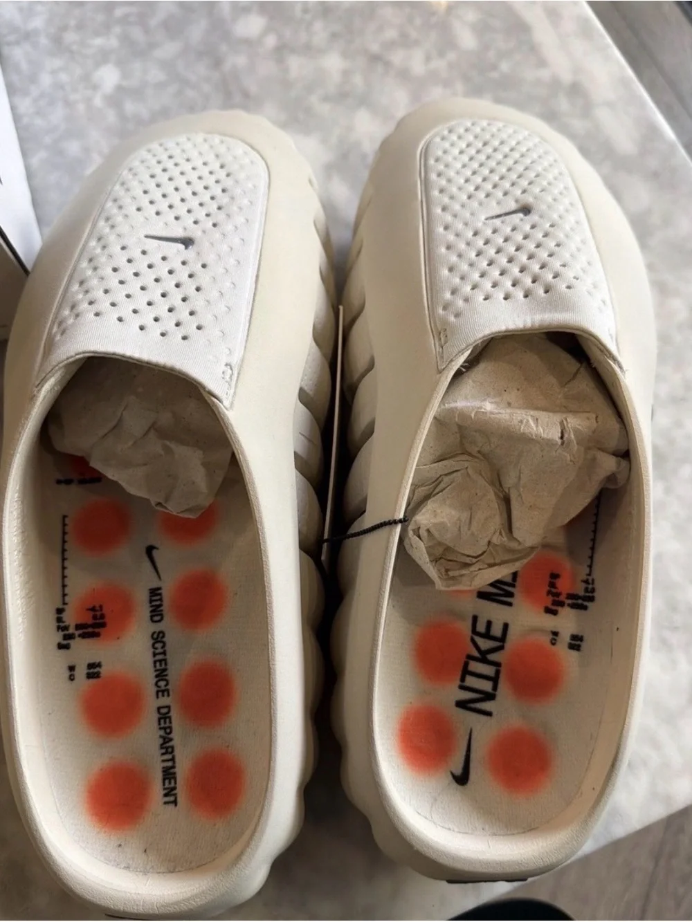 Nike Cream Foam Slip-On with Orange Outsole Accents